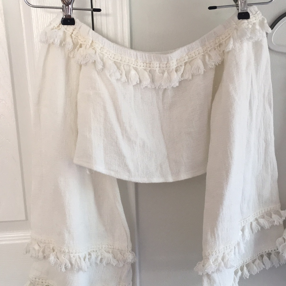 Two piece off white short skirt set.